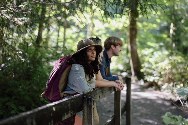 People on a hike with their Synik 26s